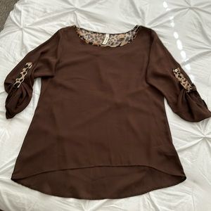 Dark brown Mid sleeve blouse, with leopard print trim. Size L.